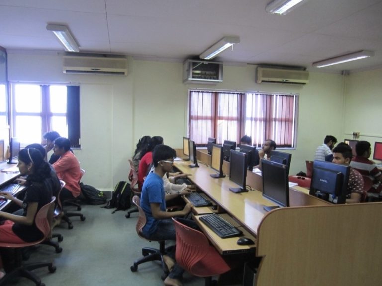 Students seated at computers in the open-source laboratory